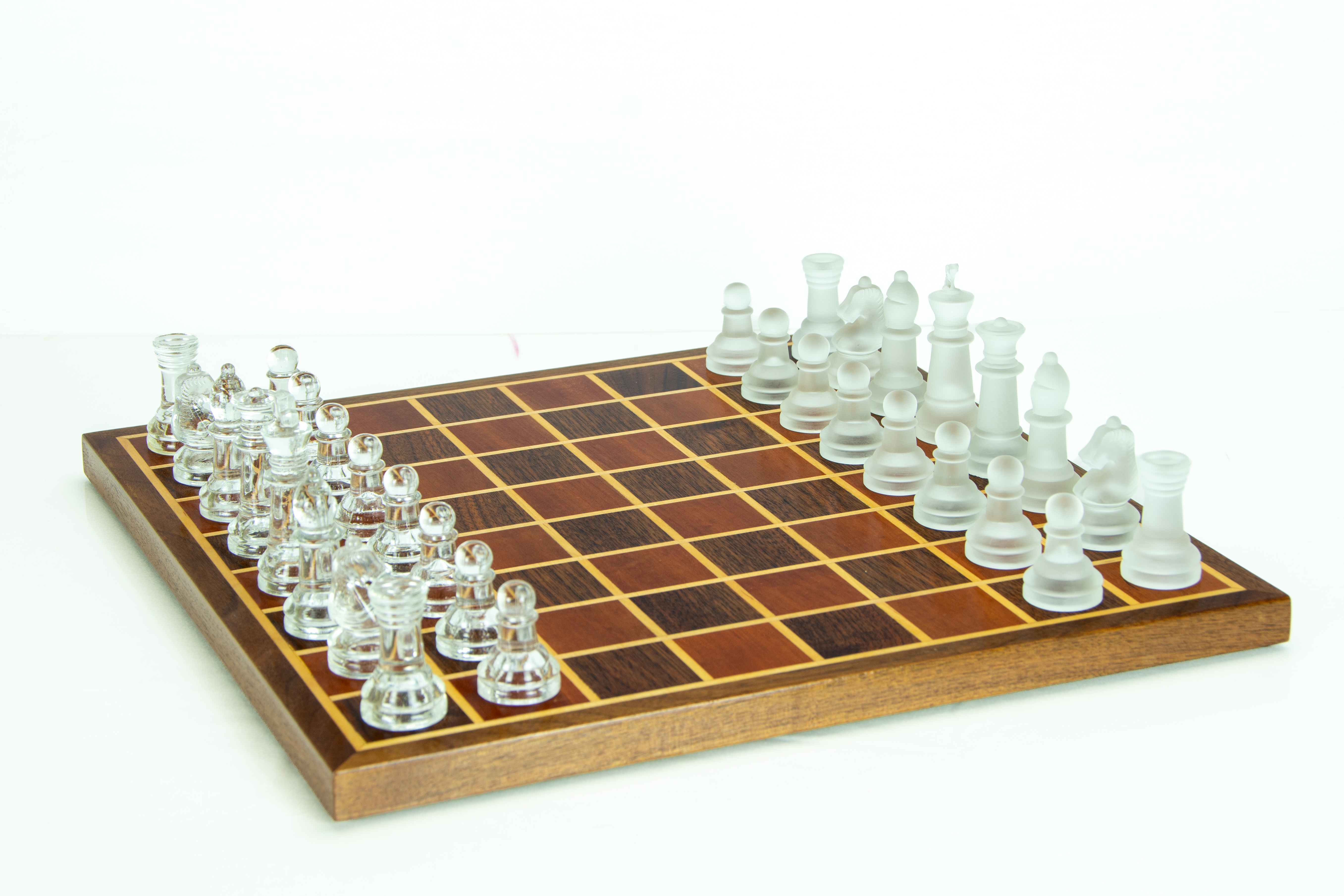 Heirloom Chessboard — walnut and cherry squares in a maple grid, framed in walnut